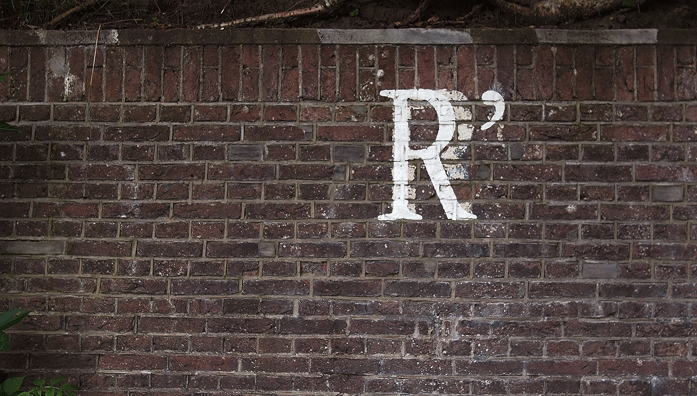 R written on a wall